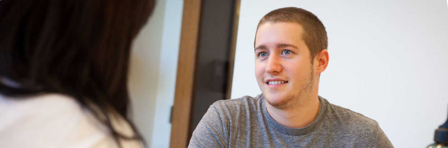 Curry College student in an advising session with professor