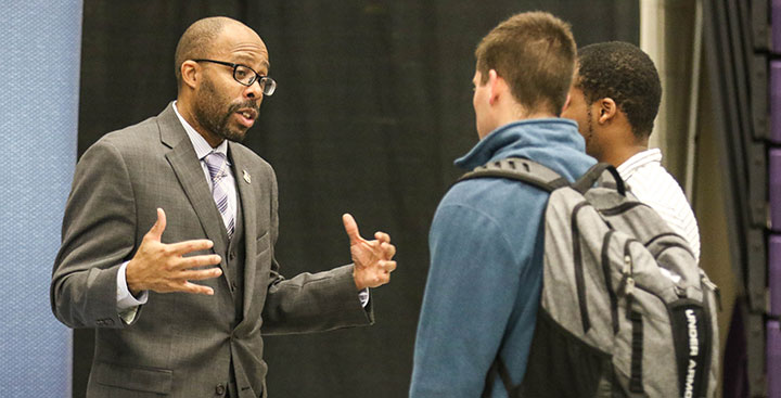 A Curry College Center for Career Development Employer partner networks with current students