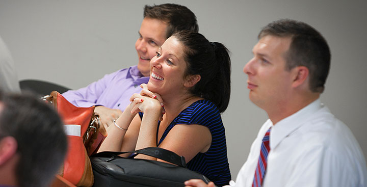 Curry College adult students in a professional development related classroom discusses a topic