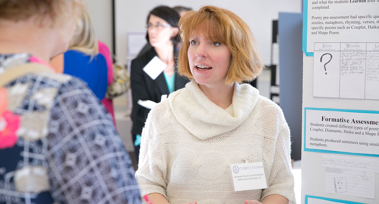 Curry College Master of Education students presents her research as part of the program's practicum