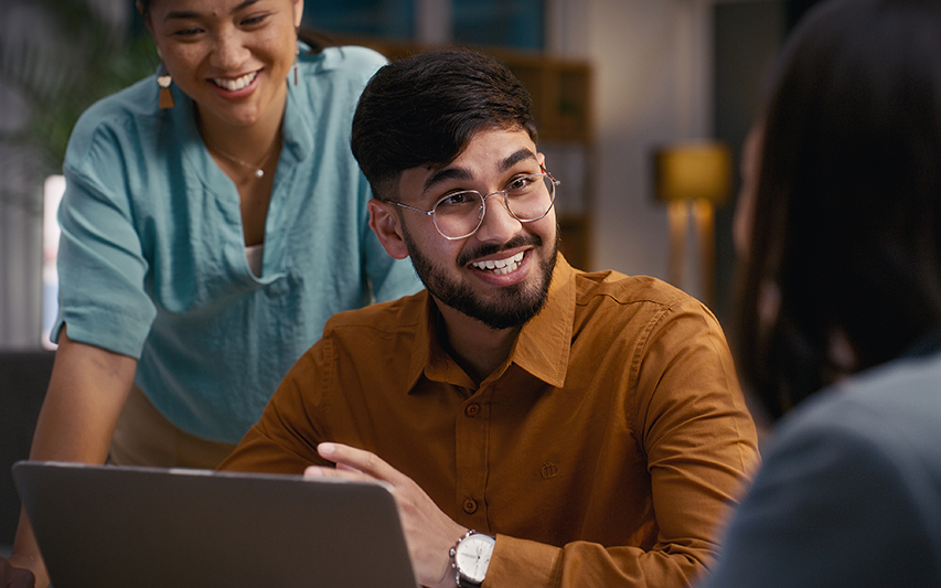 Students at their laptop pursuing an MBA