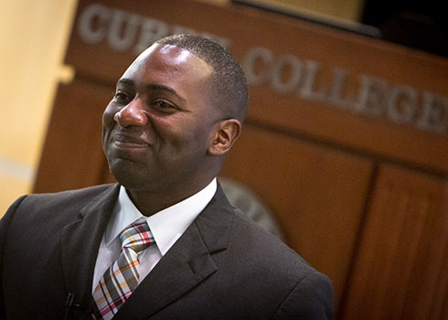Curry College Master of Arts in Criminal Justice alumnus smiles for a photo