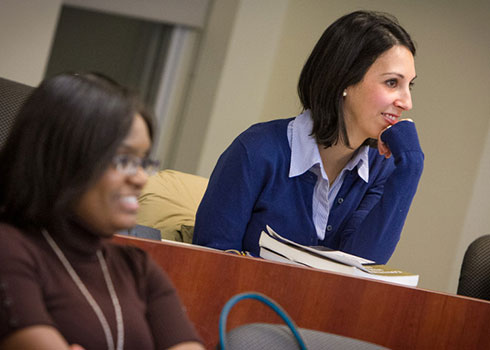 Curry College Master of Science in Accounting student smiles in class