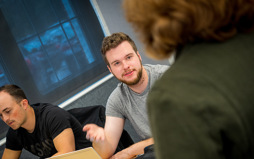 First-year student speaks to faculty