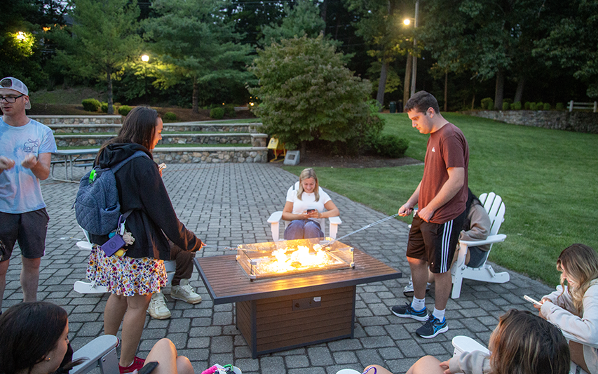 Students roast marshamallows on campus