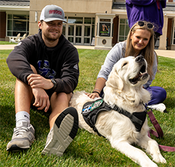 Students hang out with Graham, Curry's official support pup
