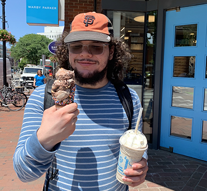 A student eats an ice cream cone