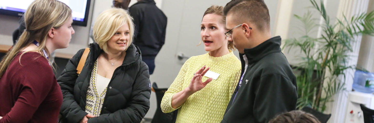 PAL parents are educated by a Curry College faculty member about the Program for Advancement of Learning (PAL)