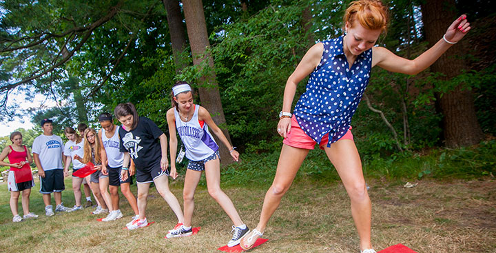 Curry College Summer PAL is represented by students completing an outdoor activity