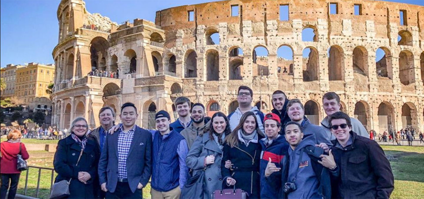 Curry College Students Abroad in Italy at the Colosseum
