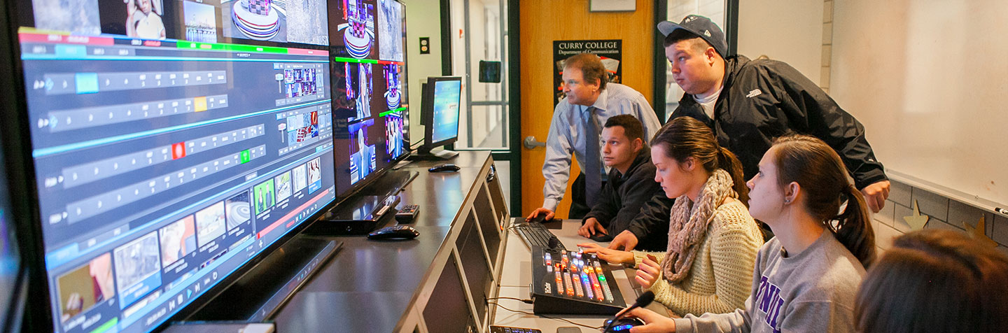 Curry College Television (CC8) students and faculty run a television show from the control booth