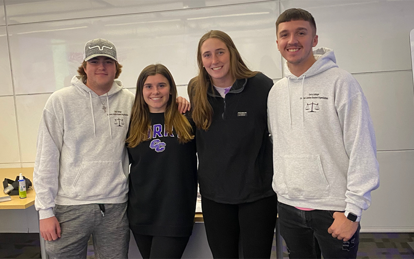 Curry College CJSO members pose for a photo