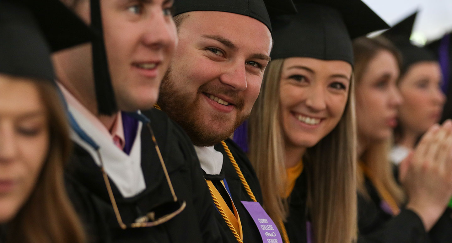 Class of 2017 Honors Program grads pose for a photo at Commencement