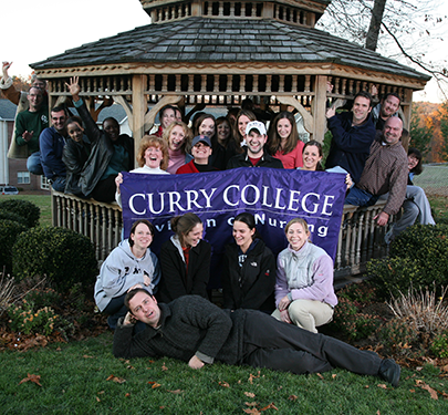 Curry Nursing students pose for a photo at the gazebo near Kennedy
