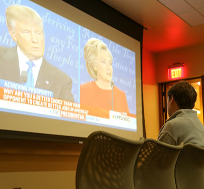 Curry College Politics and History Club members watch the 2016 Presidential Debate