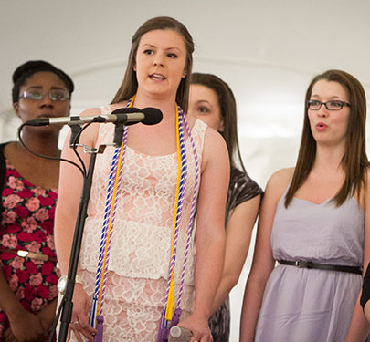 Curry College Pure Vocals a capella group sings the National Anthem