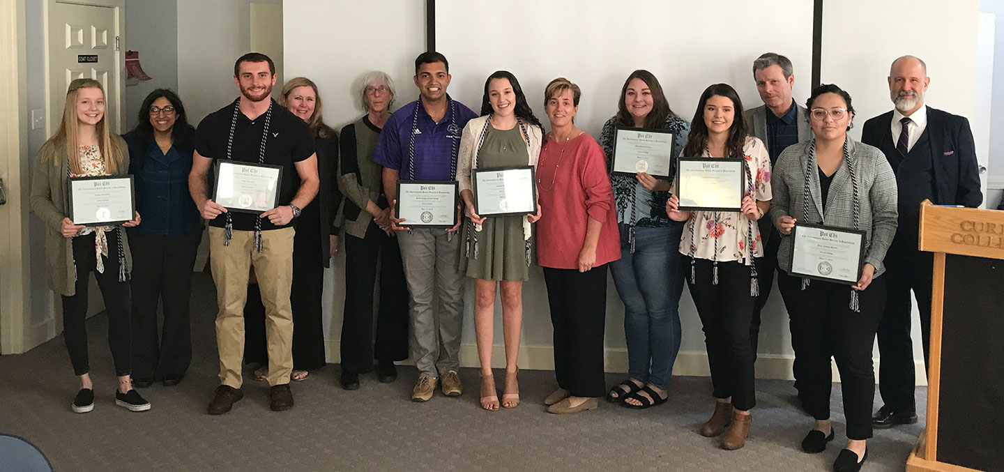 Curry College Psychology students and faculty at the Psi Chi Honor Society Induction
