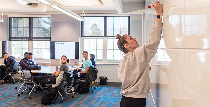 Students tutor each other in the Curry College Learning Commons