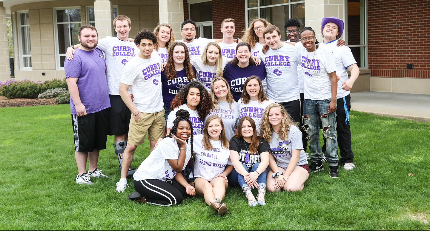 Curry College students pose for a group photo