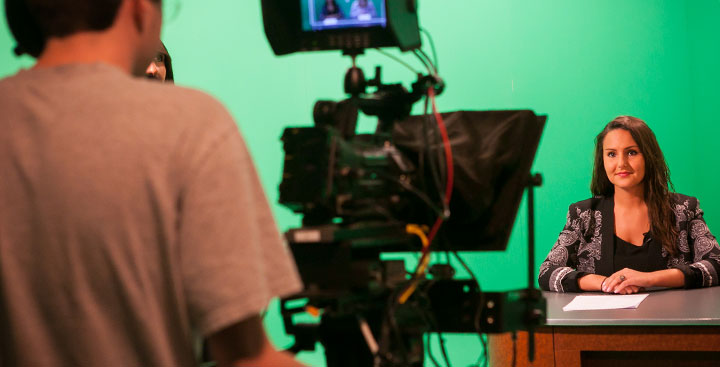 Students do a newscast in Hirsh Communication Center at Curry College