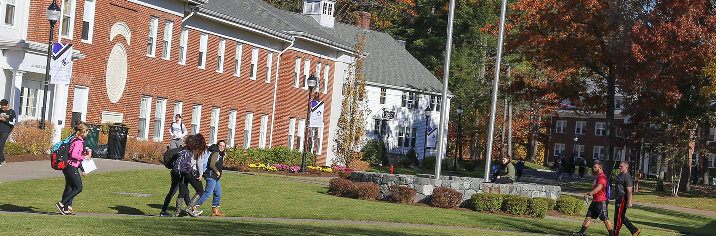 Students walking on the Quad representing Undergraduate Admission at Curry College