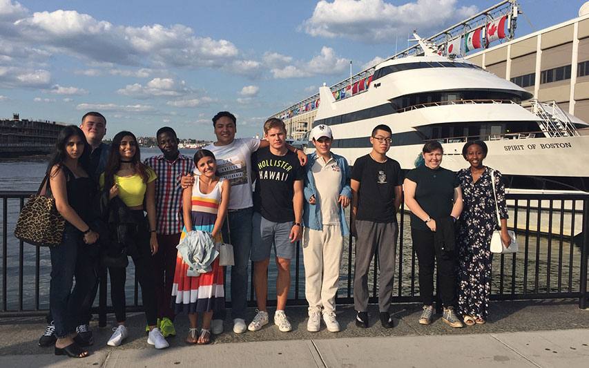 International Student Orientation participants pose for a photo on the Boston Waterfront