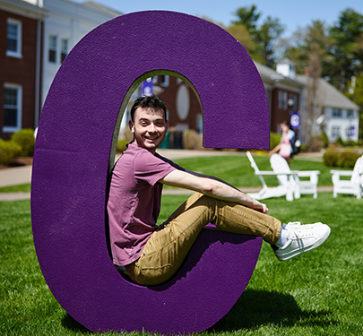 A student poses in the Curry "C"