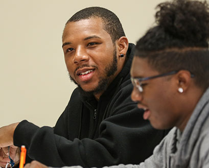 Curry College student in class