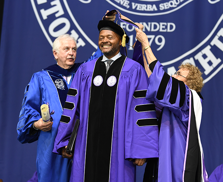 Michael Curry, Esq., Hon. '22 awarded honorary degree at Curry College Commencement