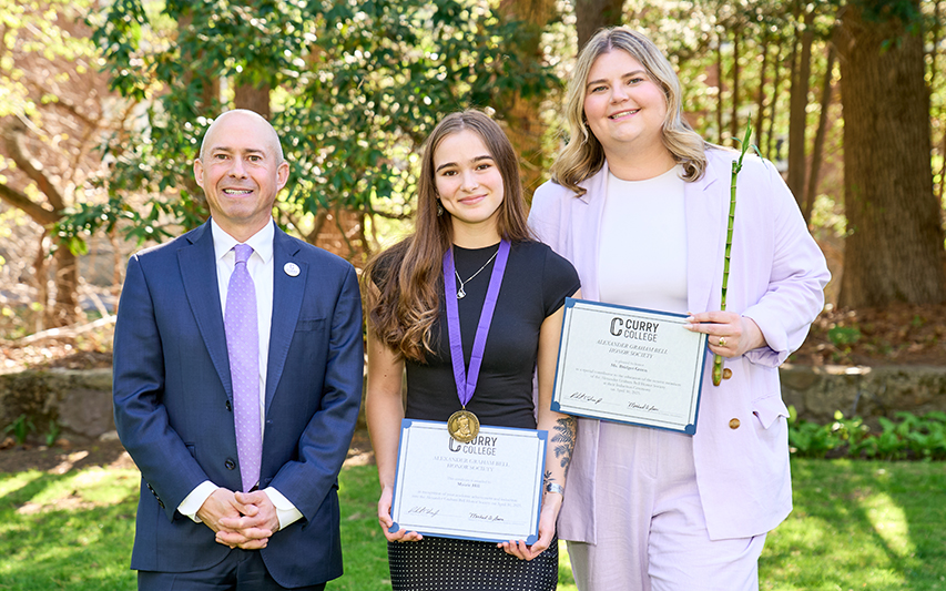 Maizie Hill poses with President Jay Gonzalez and Bridget Green holding her Alexander Graham Bell Honor Society Certificate