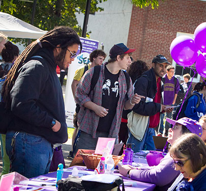 Students visit club tables at the Student Involvement Fair