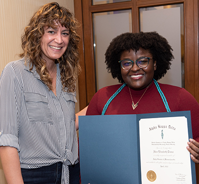 An Alpha Kappa Delta member at the induction ceremony