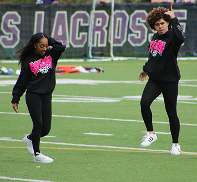 Collision Dynasty members performing at Homecoming