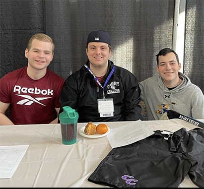 Men's hockey captains pose at Accepted Student Day