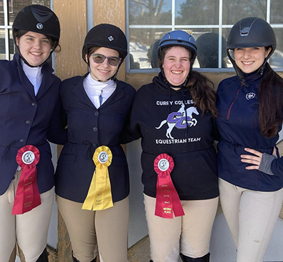 Equestrian Club members display their ribbons