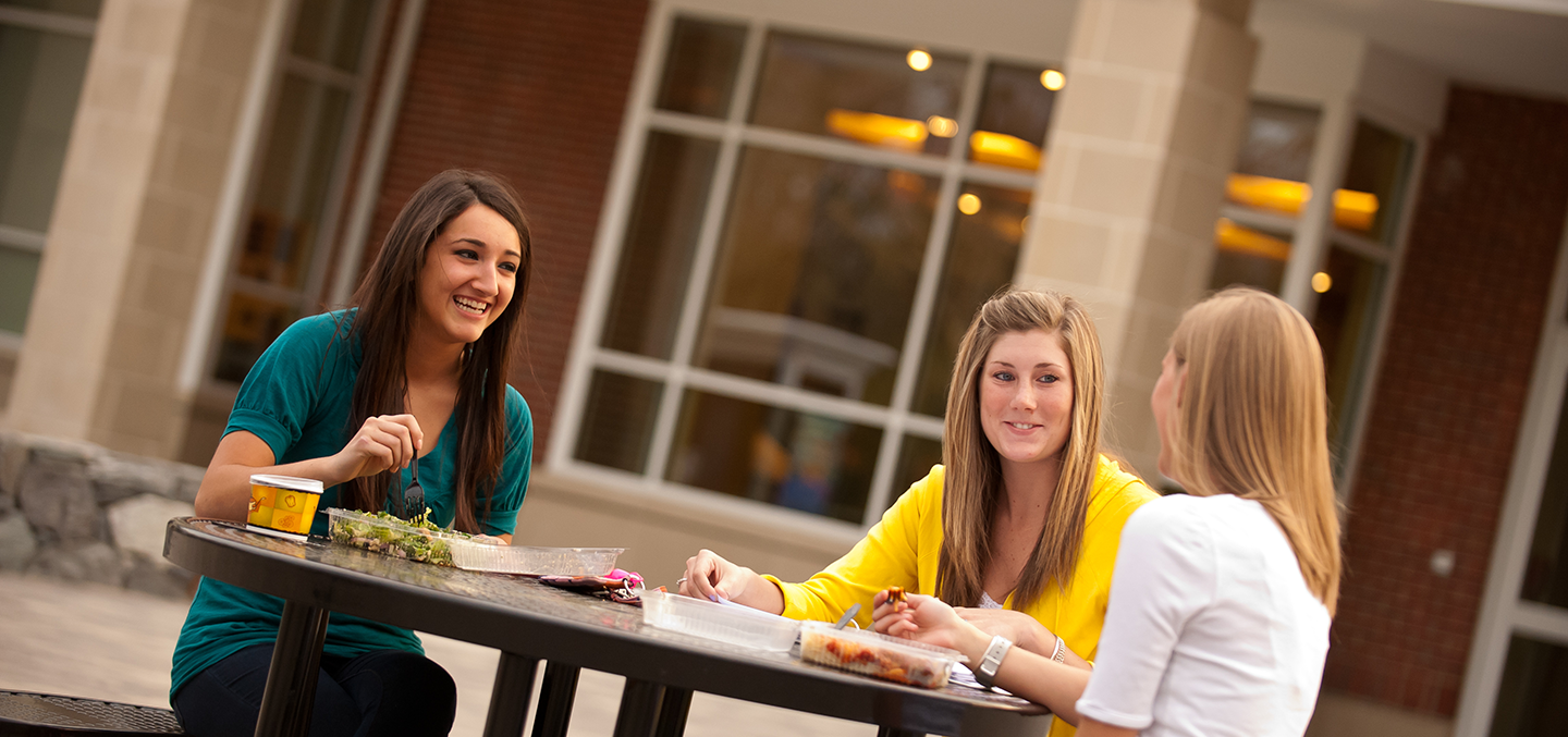 Students smile for the camera