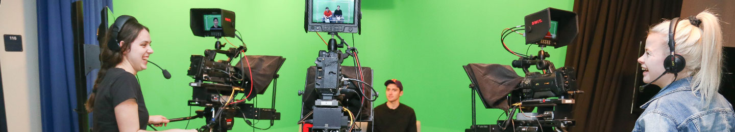 Communication students in the studio shooting a television show