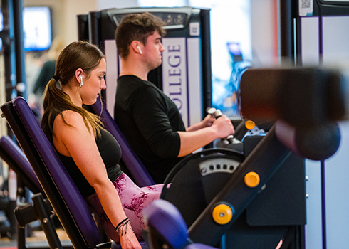 Students work out in the Curry College Fitness Center
