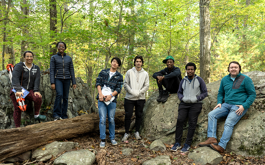 Dr. Nate Lanning and students at Houghton's Pond