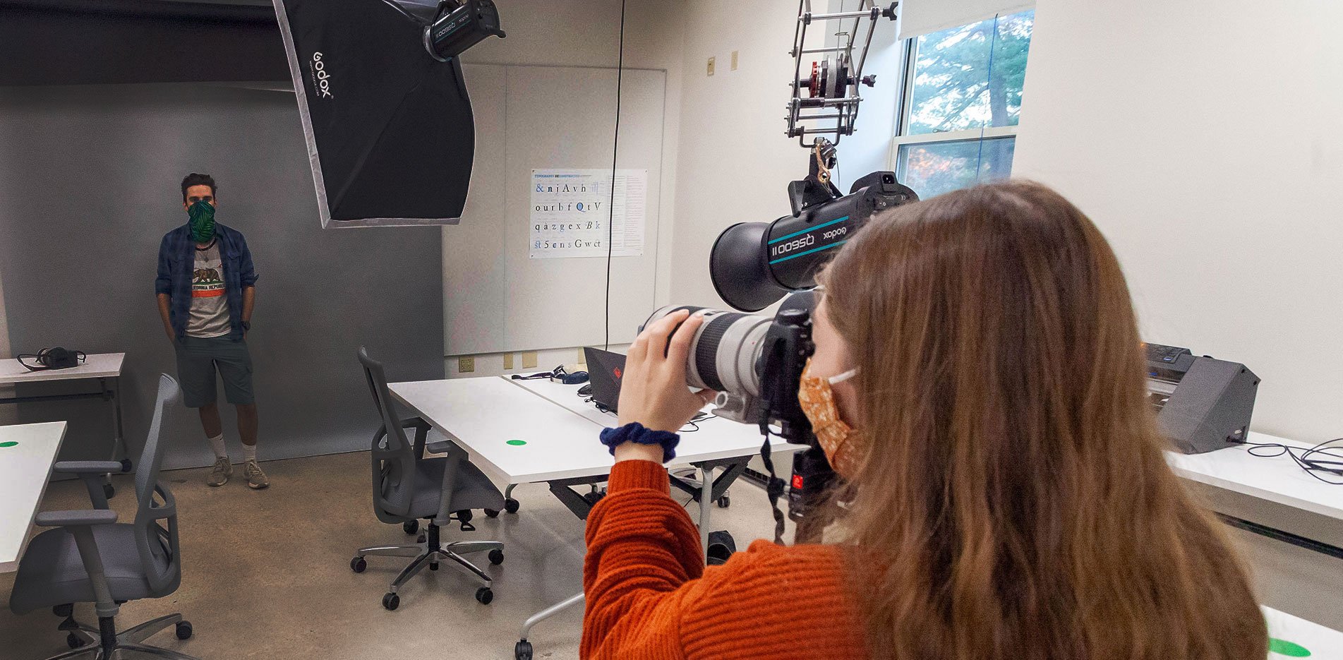 Photography Students conduct a photo shoot in the new Curry College ThinkTank design studio