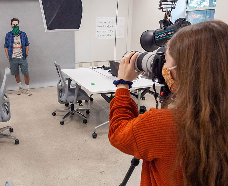 Photography Students conduct a photo shoot in the new Curry College ThinkTank design studio